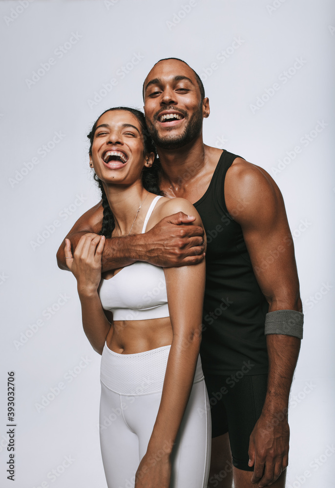 Obraz premium Laughing fit couple