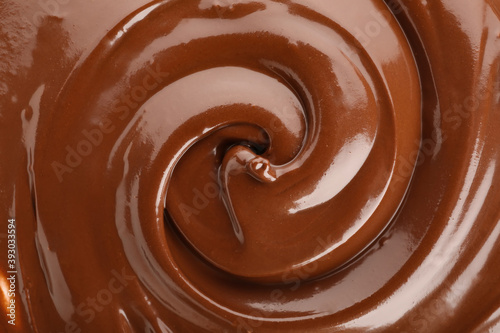 Sweet melted chocolate as background, closeup