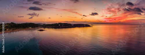 The beautiful beach of Kavouri in Vouliagmeni at the south coast of Athens  Greece  during sunset time