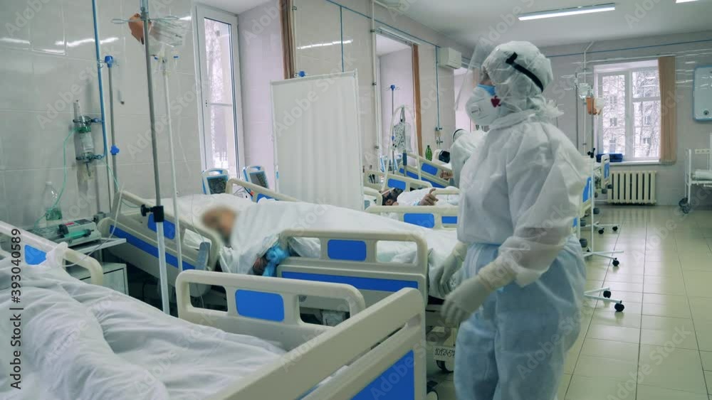 Health workers taking care of patients with coronavirus at a medical center Health workers taking care of patients with coronavirus at a medical center