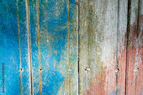 Wooden surface covered with splattered paint.