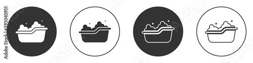 Black Baby bathtub with foam bubbles inside icon isolated on white background. Circle button. Vector.
