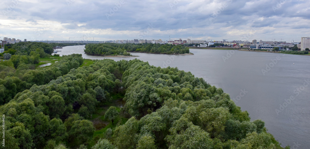 View of the embankment and the historical part of the city of Omsk in Russia from the Leningrad bridge on the Irtysh river-2