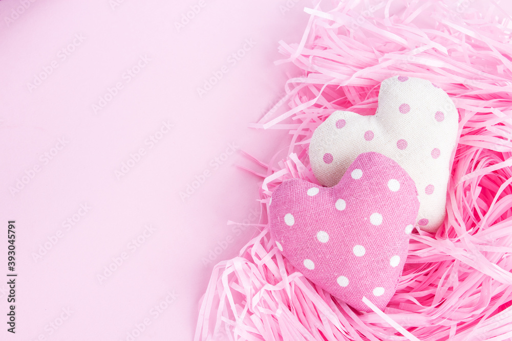 Gentle Valentine's Day background. Hearts on a pink background. Happy holiday greetings concept. Place for text. Flat layout. Gentle Valentine's Day background. Hearts on a pink background. Happy holiday greetings concept. Place for text. Flat layout.