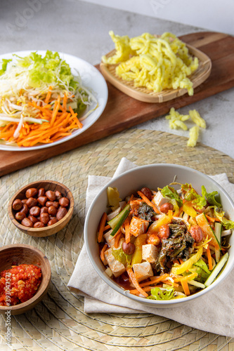 Asinan Bogor. Indonesia traditional salad from Bogor West Java. Tropical fruits pickled in a sweet, spicy, sour, and salty brine. Javanese Indonesian food