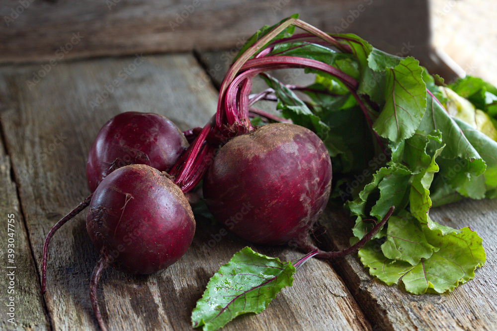 Beet, beetroot bunch on grey wooden background. Beet, beetroot bunch on grey wooden background.