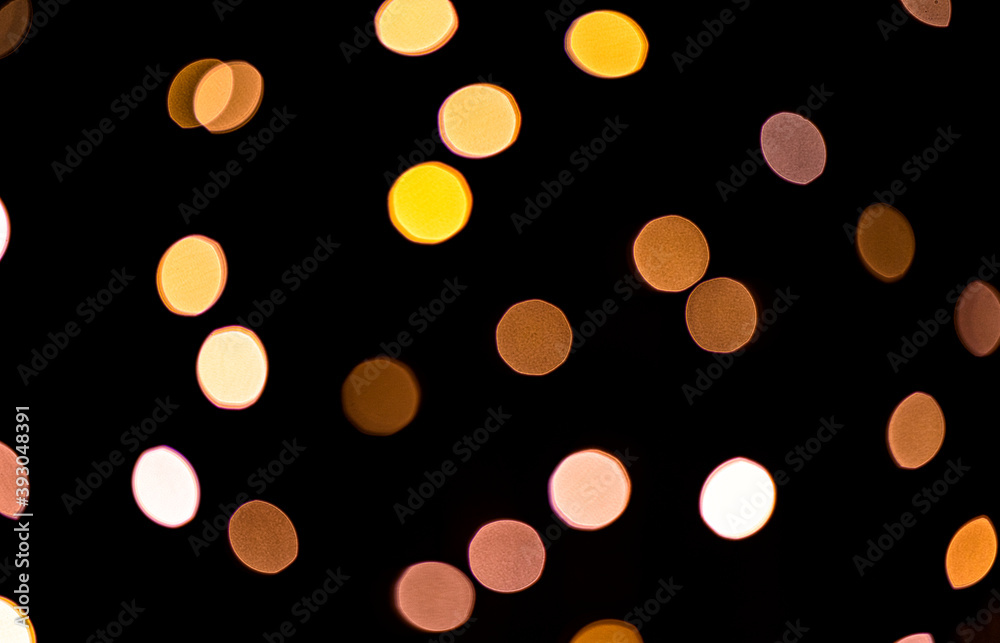 Bright bokeh from christmas garlands on dark background. Bright bokeh from christmas garlands on dark background.
