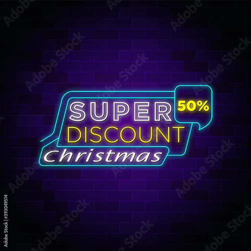 Super discount christmas sale neon tag button and sign in blue background.