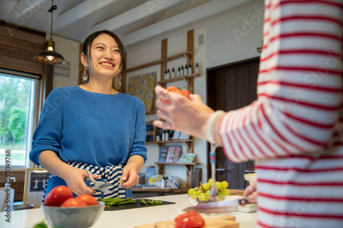 Women Cooking in the Shared Kitchen photo