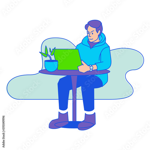 Young Man Working with Laptop on Desk