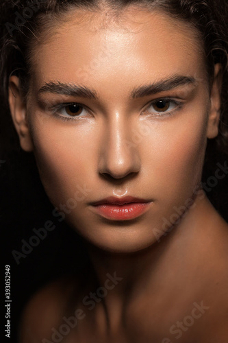 Portrait of a beautiful young girl with good skin