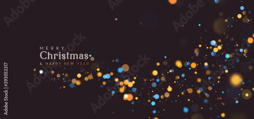 Background of bright glow bokeh. Christmas golden lights. Blur motion Night bright colorful sparkles
