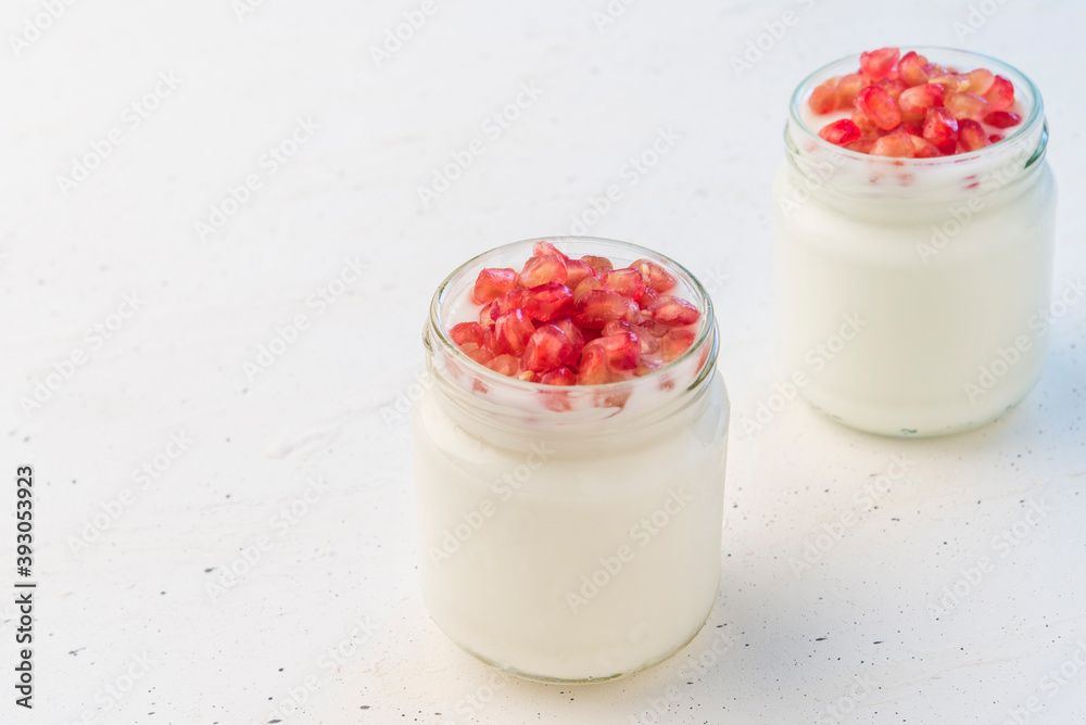 Pomegranate with natural yogurt