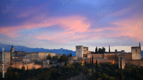 Panoramic view of Alhambra in Granada, Spain. Alhambra fortress and Albaicin quarter at twilight sky scene-Autumn season mood