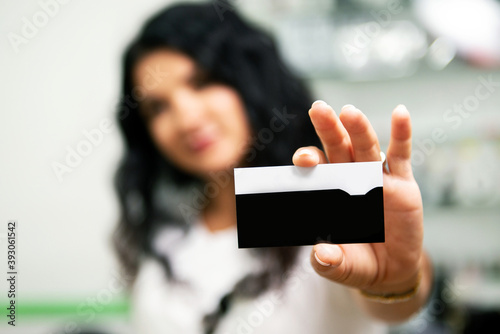 business card in hand close-up