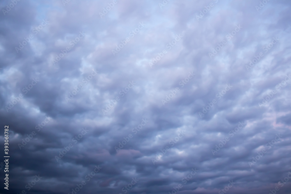 A photo of gray clouds covering the sky as a background material