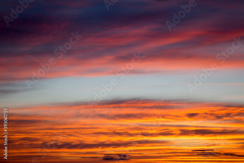 Photograph of the sunset sky dyed in orange as a background material