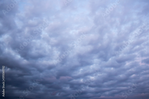 A photo of gray clouds covering the sky as a background material