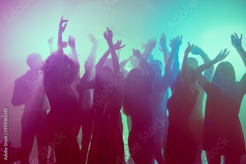 Photo of people charming girls dance raise hands concert event wear stylish outfit modern club indoors