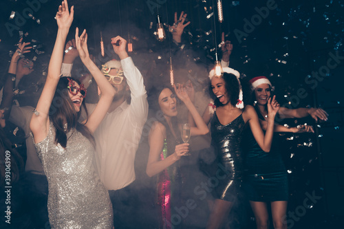 Photo of people party guy flirt girl having fun wear glossy dress santa spectacles trendy outfit modern club indoors