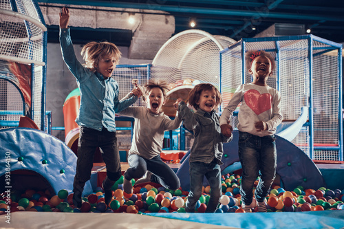 Children in the entertainment center have fun.  photo