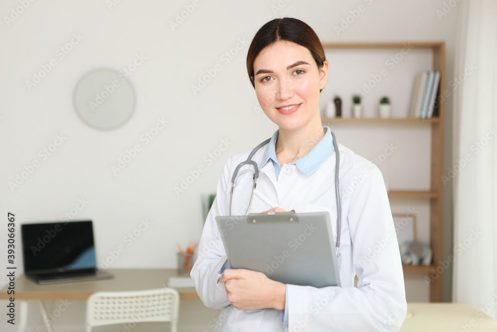 young girl doctor in the interior of the office of the medical center young girl doctor in the interior of the office of the medical center