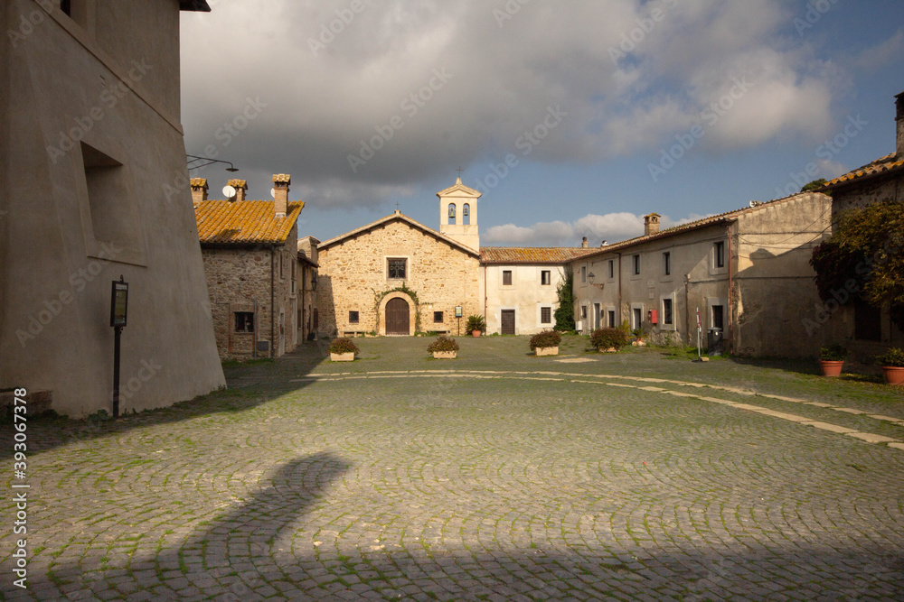 Church of the Holy of Sasso Cerveteri ,The 16th century church, With overlooks the square that paved with bricks arranged in an ear of wheat, situated at the foot of Monte Santo.