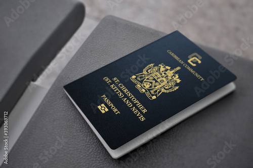 saint kitts and Nevis passport On a leather seat photo
