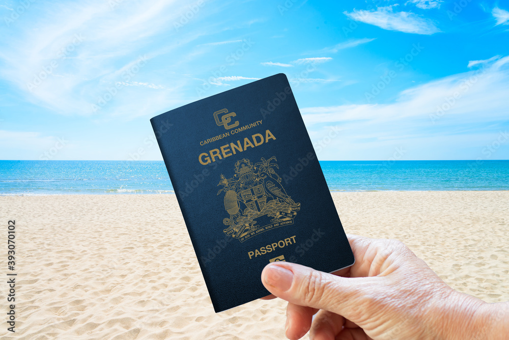 grenada passport with a sea and beach background - obrazy, fototapety, plakaty 