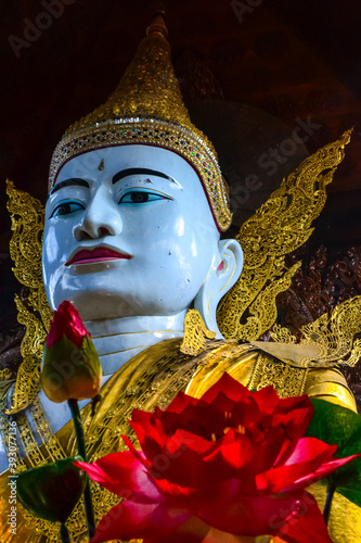 Vertical shot of the big statue of Gautama Buddha in Ngar Htat Gyi Pagoda, Yangon, Myanmar photo