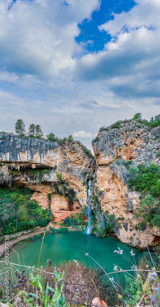Top view of Turche cave and waterfall under the clouds in Valencia