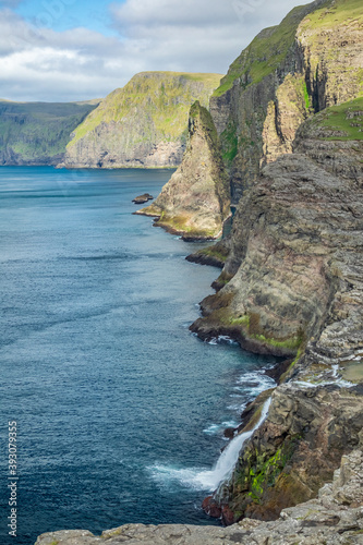 Bosdalafossur waterfall vertical composition in Faroe Islands