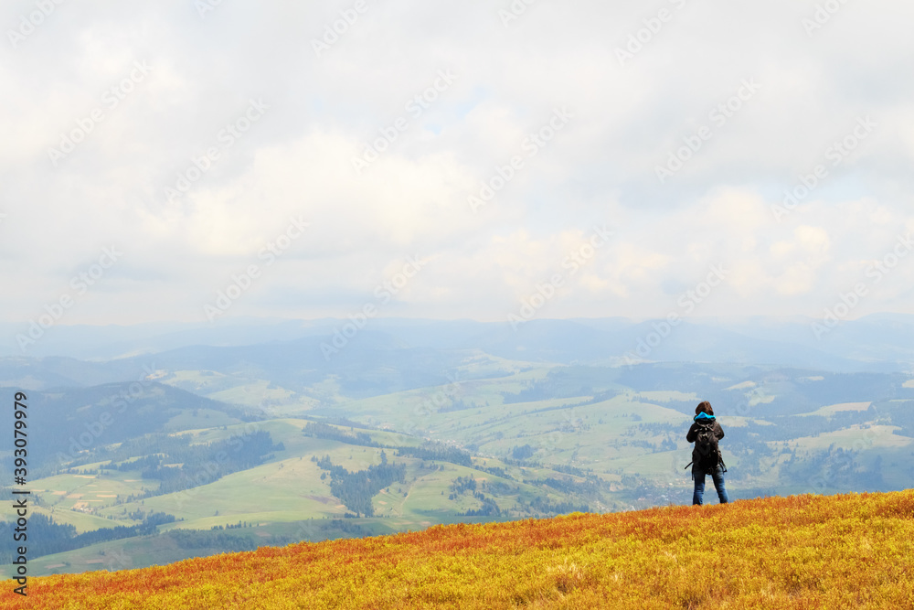 Photographers take pictures of spring view from the top of the mountain Gemba in the Carpathians