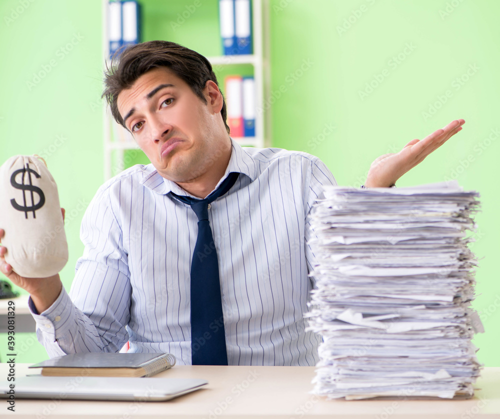 Fototapeta premium Businessman having problems with paperwork and workload