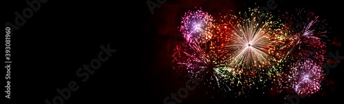 Realistic 3D illustration colorful gold luxury firework pyrotechnic night dark sky smoke isolated black background wallpaper use celebrate happy new year countdown festival anniversary birthday party