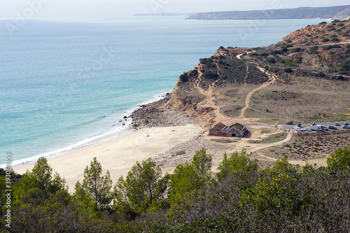 panoramic view of Praia Boca do Rio at south coast of the Algarve near Budens and Burgau with popular parking for Campers / wild camping photo