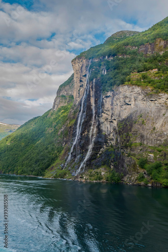  large waterfall over a fjord in northern norway