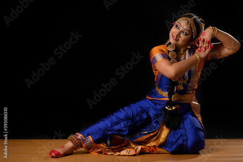 Kuchipudi dancer portraying Goddess Radha resting on Lord Krishnas shoulder	