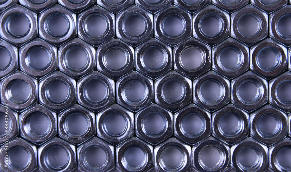 Background of ordered nuts on a light wooden background Background of ordered nuts on a light wooden background