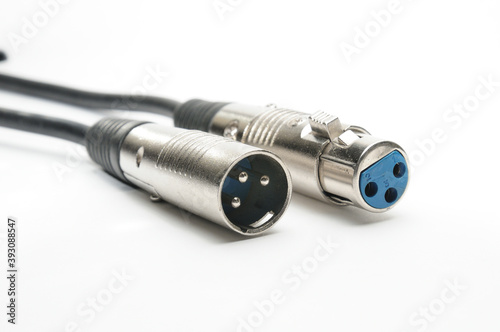 Audio cable with XLR connectors for microphones and professional audio equipment on a white background