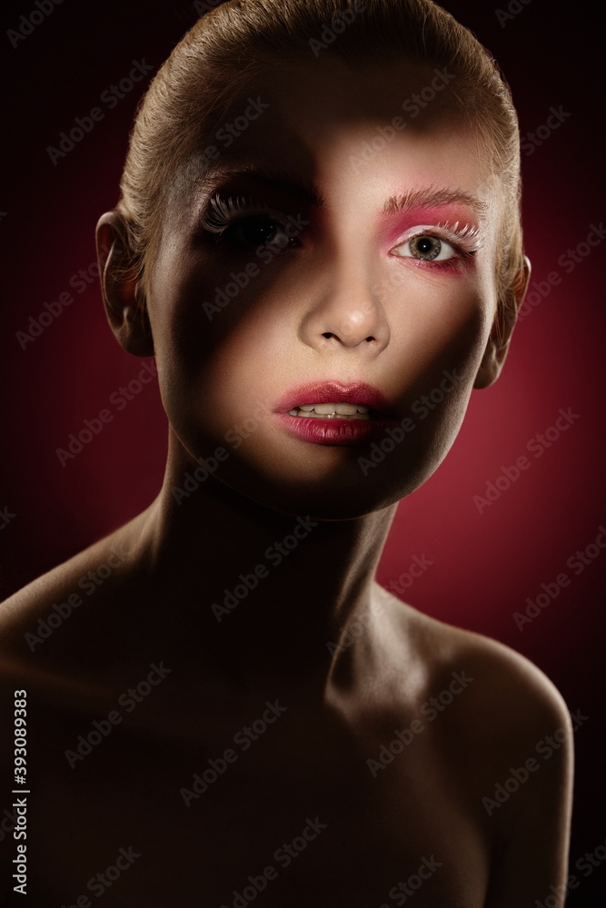 portrait of a beautiful girl with artful makeup and studio lighting portrait of a beautiful girl with artful makeup and studio lighting