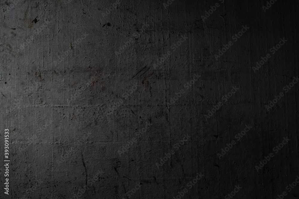 Fototapeta premium Rugged black concrete wall background