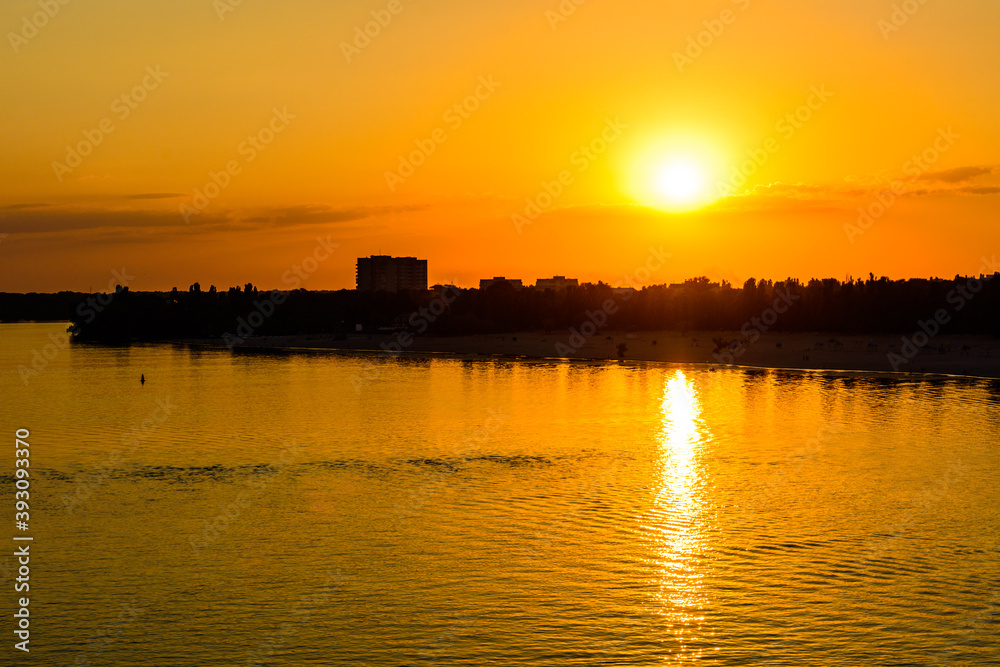 View on a Dnieper river and city Kremenchug at sunset