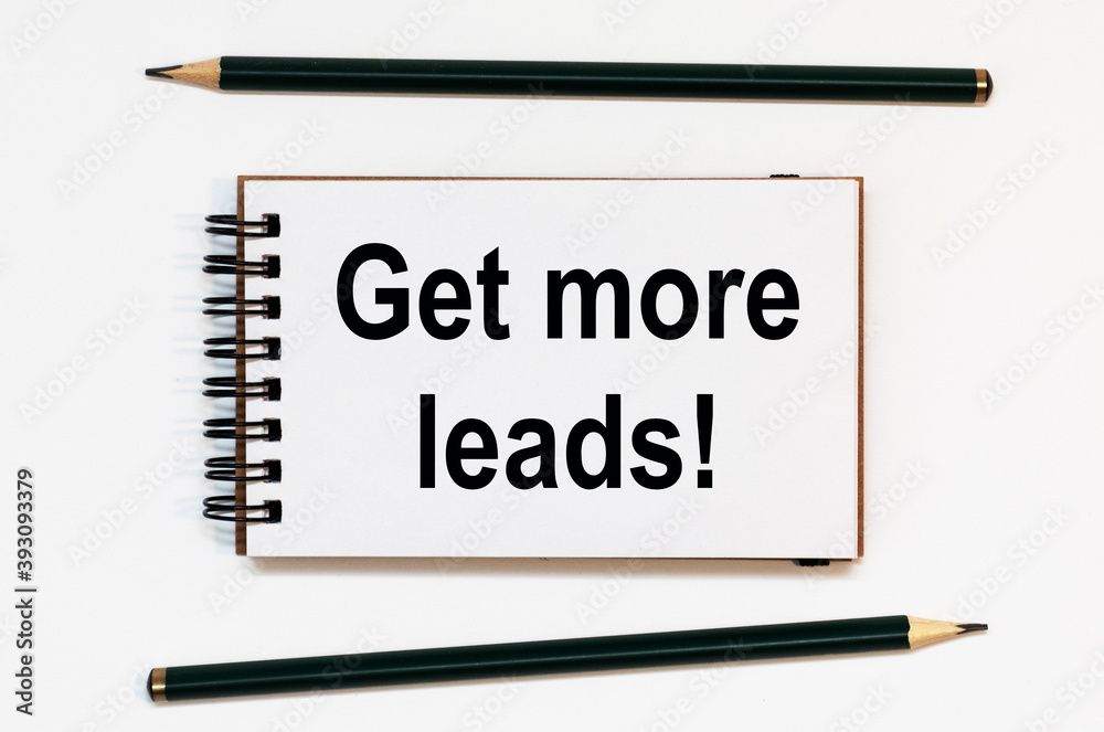 WHITE SPIRAL NOTEBOOK, TWO PENCILS WITH TEXT GET MORE LEADS WHITE SPIRAL NOTEBOOK, TWO PENCILS WITH TEXT GET MORE LEADS