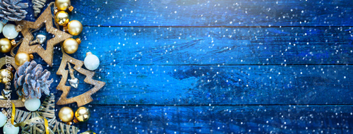 Tableau sur toile A Blue Christmas banner background with hand-made decoration stars and  Christma