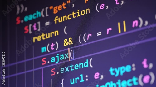 Code. Colorful jsx javascript computer programming code scroll close up pixel detail shot 4K super macro on screen.