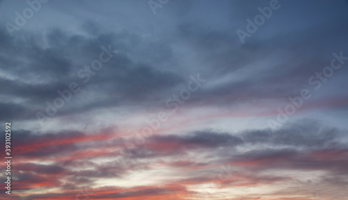 Pink sky with clouds at sunset, nature background