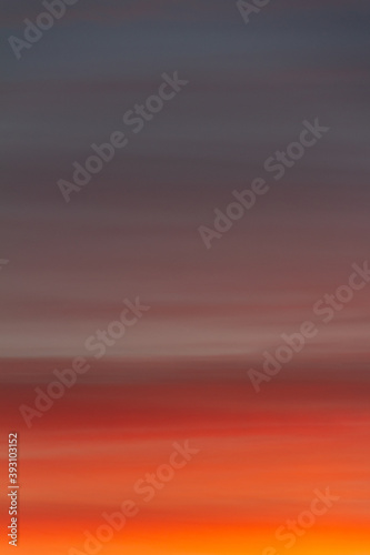Wonderful autumn evening sky of various pleasant colors (blue, purple, pink, orange, yellow) at sunset