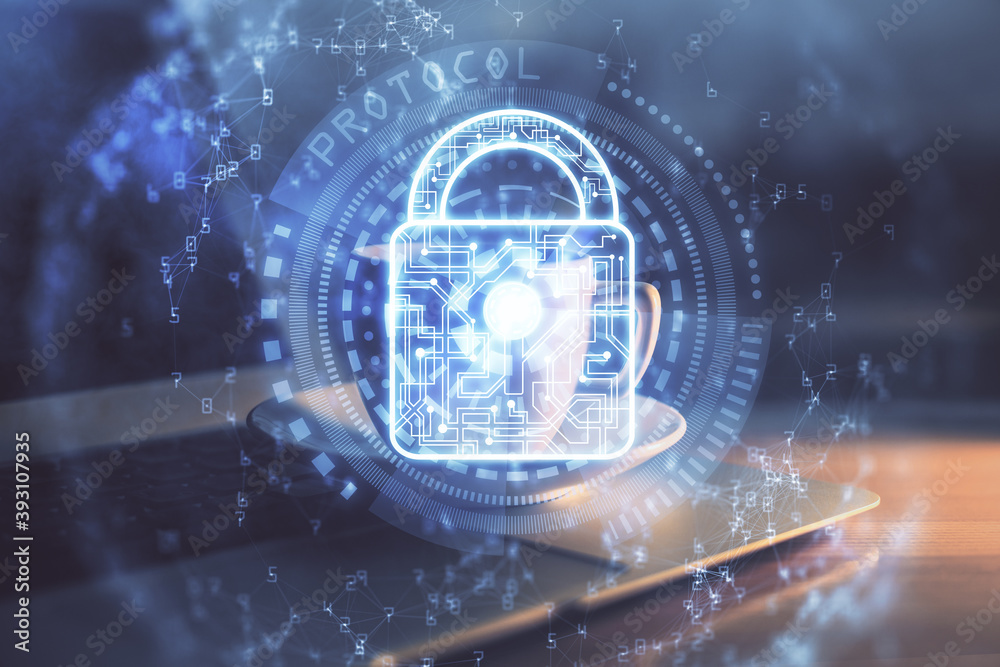 Obraz premium Double exposure of desktop with computer and lock icon hologram. Concept of data safety.