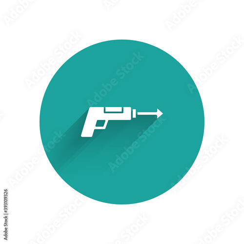 White Fishing harpoon icon isolated with long shadow. Fishery manufacturers for catching fish under water. Diving underwater equipment. Green circle button. Vector.